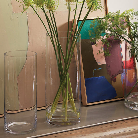 Detail, The Column Vase from LSA is a contemporary, straight sided cylindrical vase made from clear mouth blown glass. The Column Vase features a heavy base, thick walls and cut and polished rims with all finishing done by hand.