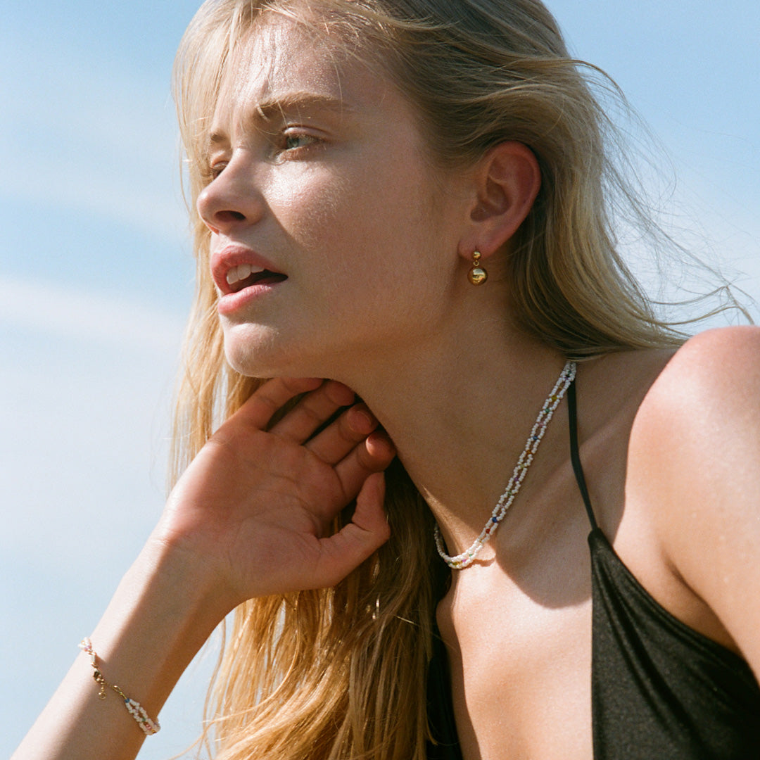 The Drop of Gold Earrings by Anni Lu radiate understated elegance