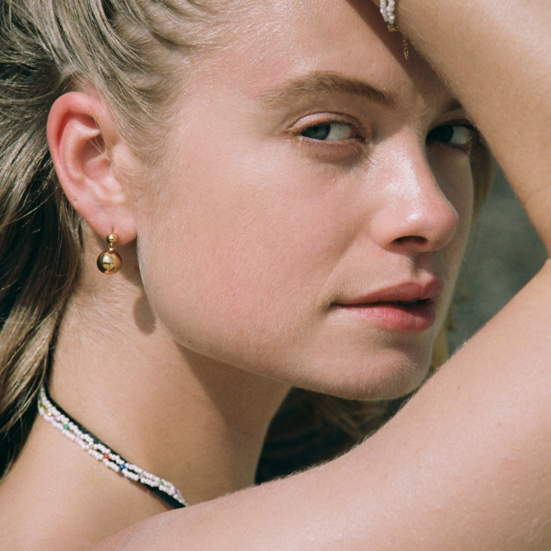 The Drop of Gold Earrings by Anni Lu radiate understated elegance