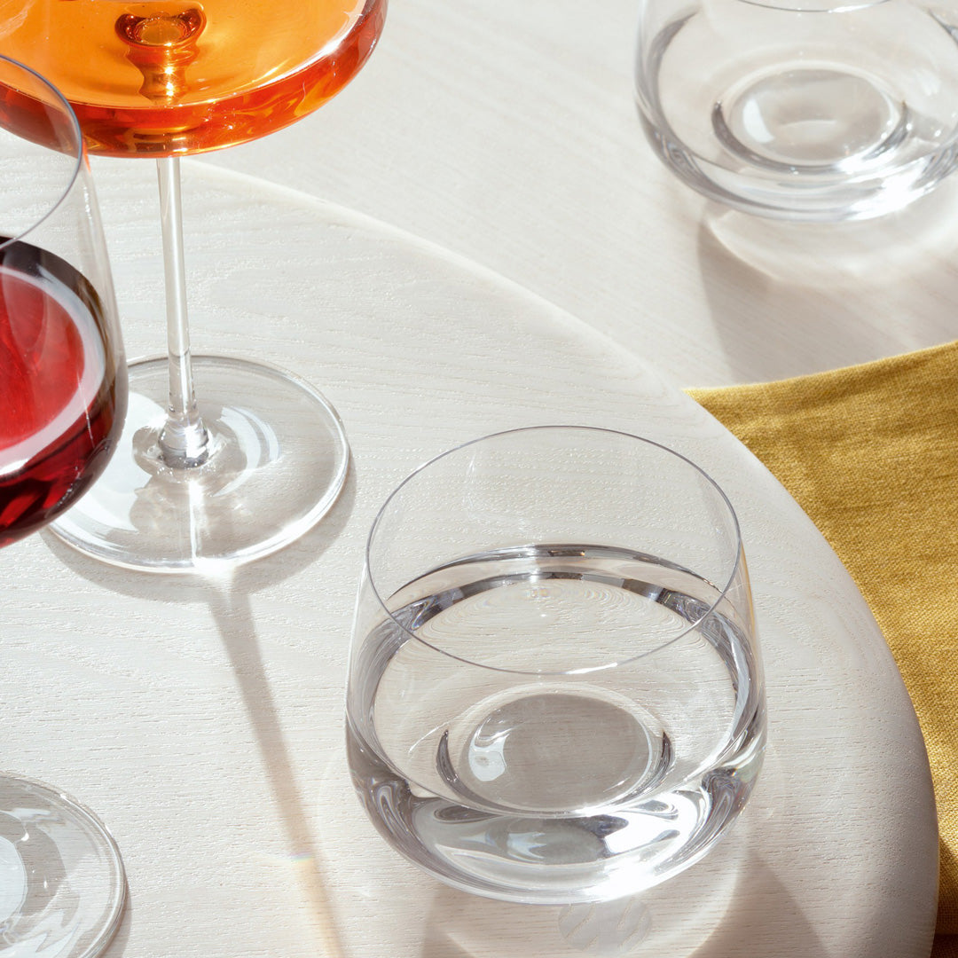 Metropolitan Tumbler is a contemporary wide and low everyday drinking glass with an angular profile. Durable and versatile, this tumbler can be used for a variety drinks including water, short cocktails and wine.