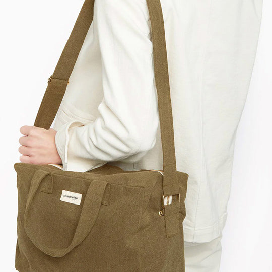 The Sauval bag in Military Green from Parisian brand Rive Droite is a compact everyday messenger bag made from recycled cotton.