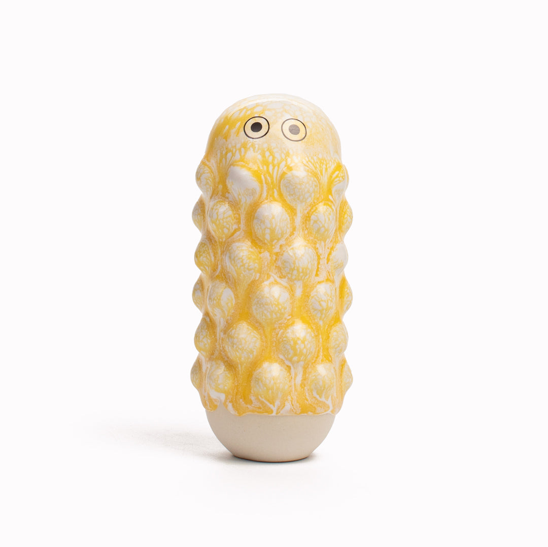Meet Mimi! Mimi is a barnacle encrusted, bobbly, hand glazed ceramic figurine created as a close relative of the classic Arhoj Ghost.