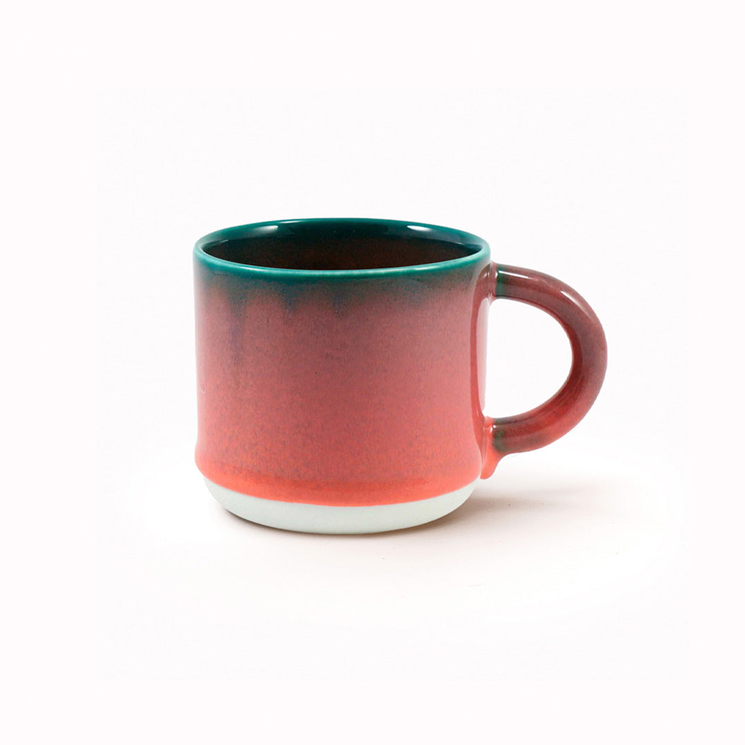 The Chug Mug by Studio Arhoj features their trademark thick, hand poured coloured glaze which means that each mug is unique. These superb mugs have a large handle and hold a good 'chuggable' serving of coffee or tea.