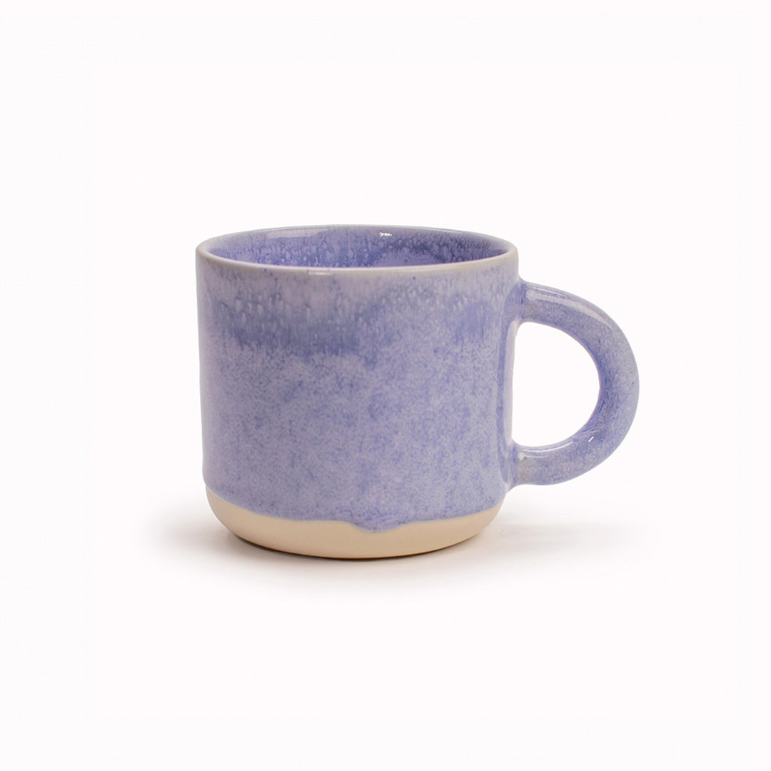 The Chug Mug by Studio Arhoj features their trademark thick, hand poured coloured glaze which means that each mug is unique. These superb mugs have a large handle and hold a good 'chuggable' serving of coffee or tea.
