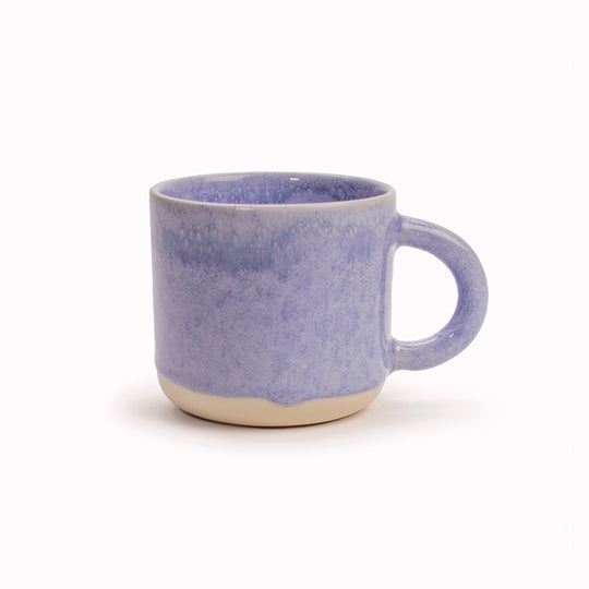 The Chug Mug by Studio Arhoj features their trademark thick, hand poured coloured glaze which means that each mug is unique. These superb mugs have a large handle and hold a good 'chuggable' serving of coffee or tea.