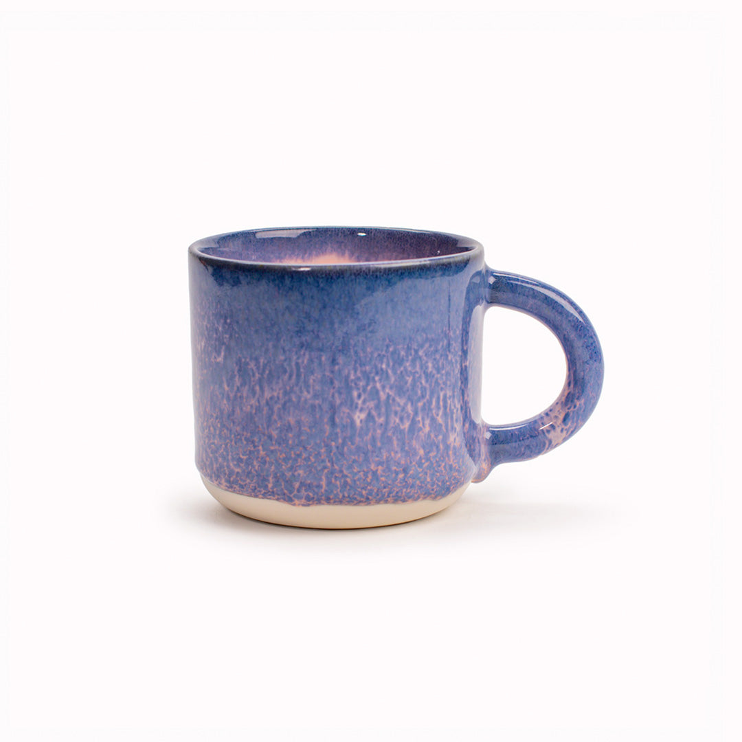 The Chug Mug by Studio Arhoj features their trademark thick, hand poured coloured glaze which means that each mug is unique. These superb mugs have a large handle and hold a good 'chuggable' serving of coffee or tea.