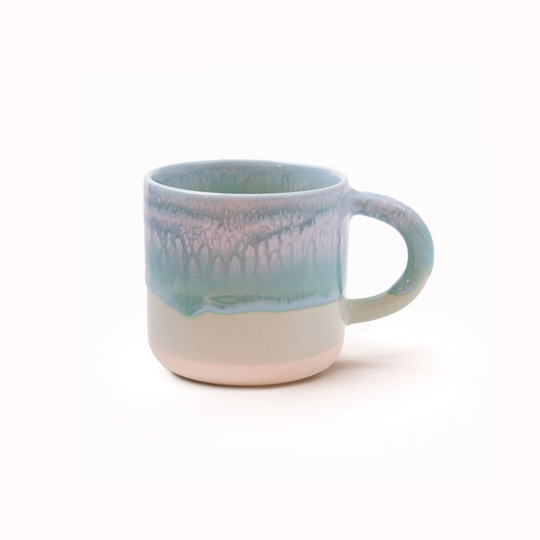 The Chug Mug by Studio Arhoj features their trademark thick, hand poured coloured glaze which means that each mug is unique. These superb mugs have a large handle and hold a good 'chuggable' serving of coffee or tea.