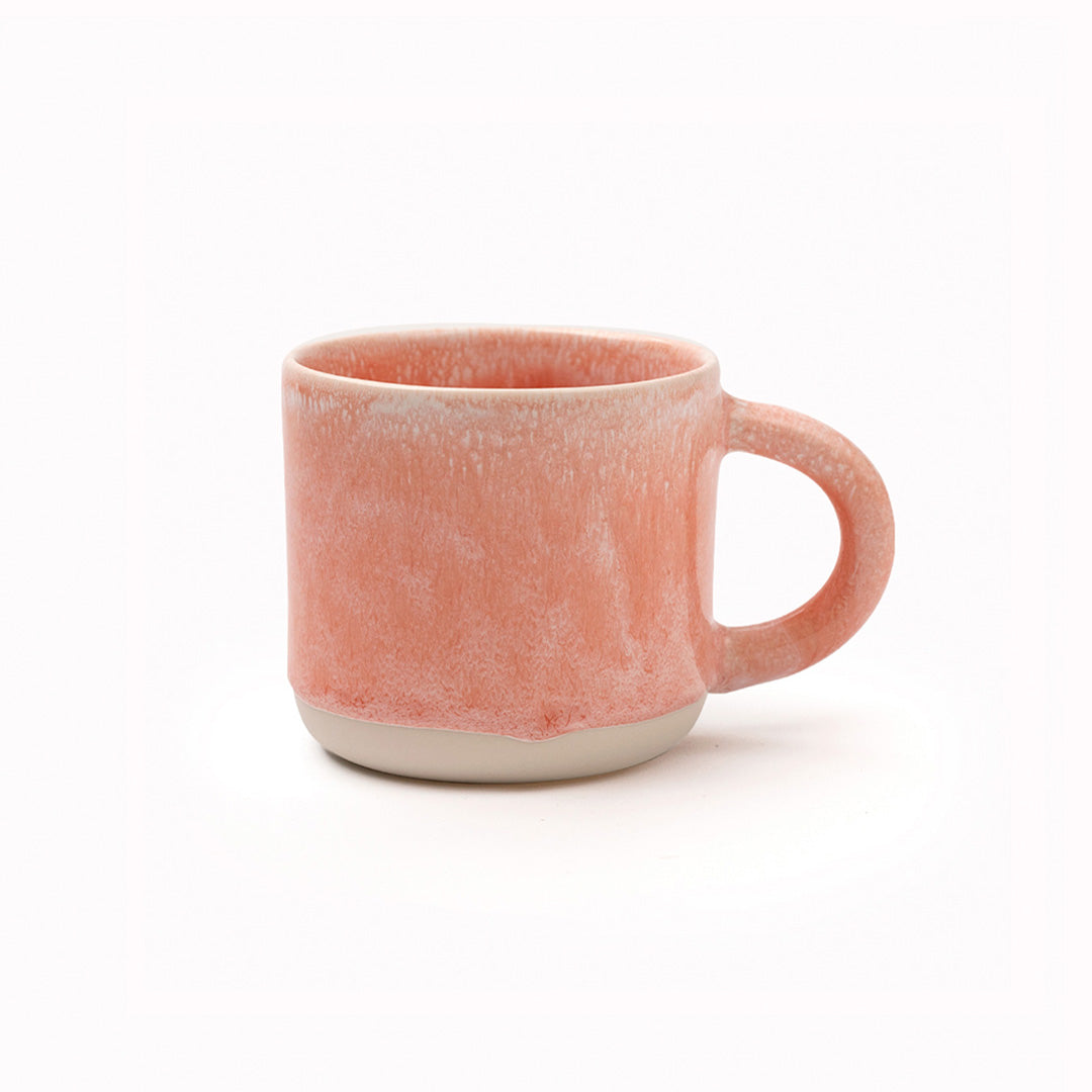 The Chug Mug by Studio Arhoj features their trademark thick, hand poured coloured glaze which means that each mug is unique. These superb mugs have a large handle and hold a good 'chuggable' serving of coffee or tea.