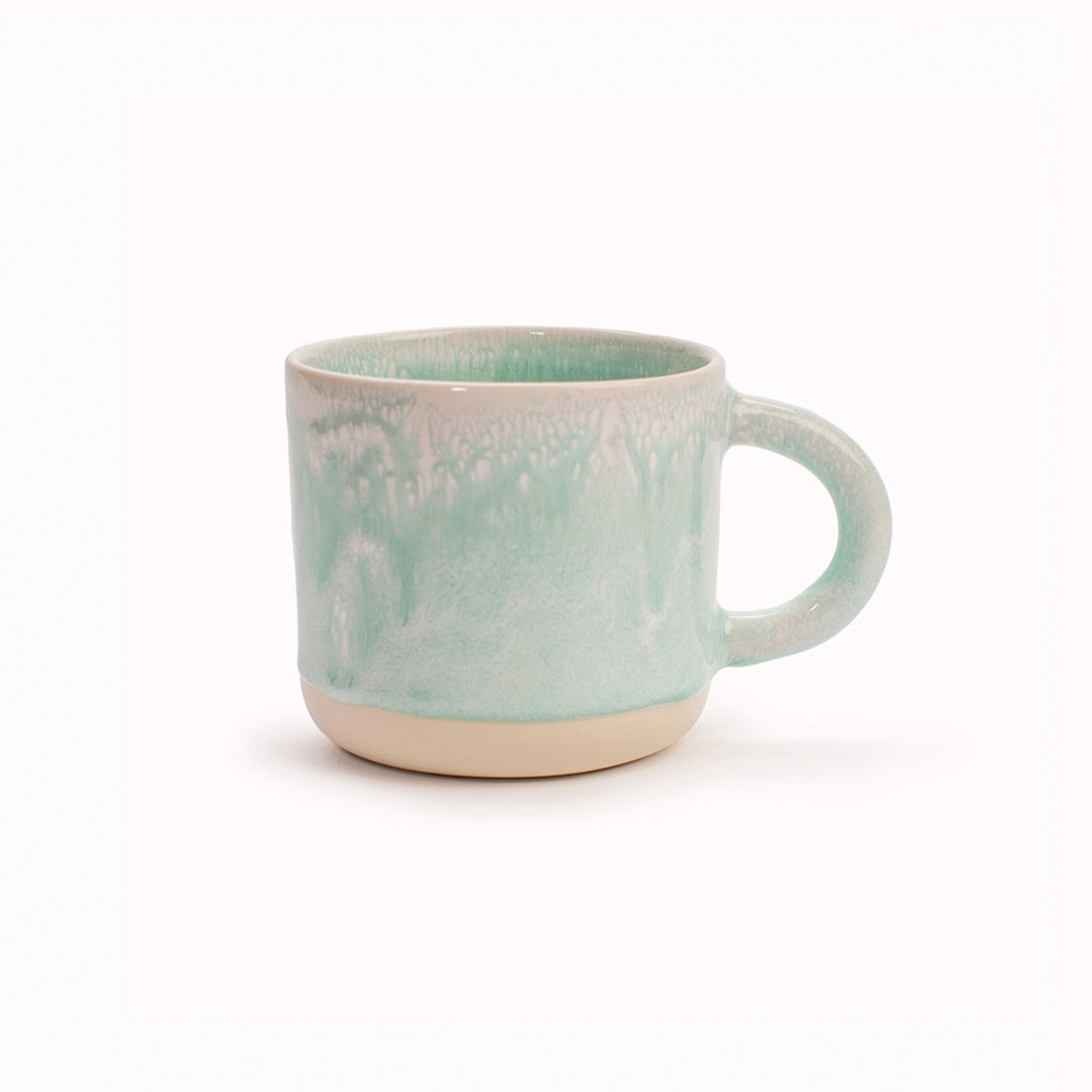 The Chug Mug by Studio Arhoj features their trademark thick, hand poured coloured glaze which means that each mug is unique. These superb mugs have a large handle and hold a good 'chuggable' serving of coffee or tea.