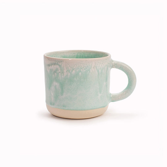 The Chug Mug by Studio Arhoj features their trademark thick, hand poured coloured glaze which means that each mug is unique. These superb mugs have a large handle and hold a good 'chuggable' serving of coffee or tea.
