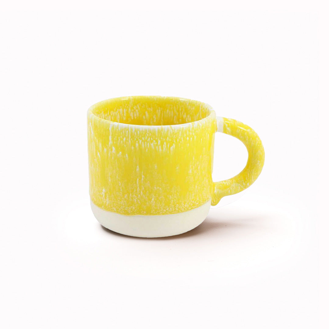 The Chug Mug by Studio Arhoj features their trademark thick, hand poured coloured glaze which means that each mug is unique. These superb mugs have a large handle and hold a good 'chuggable' serving of coffee or tea.