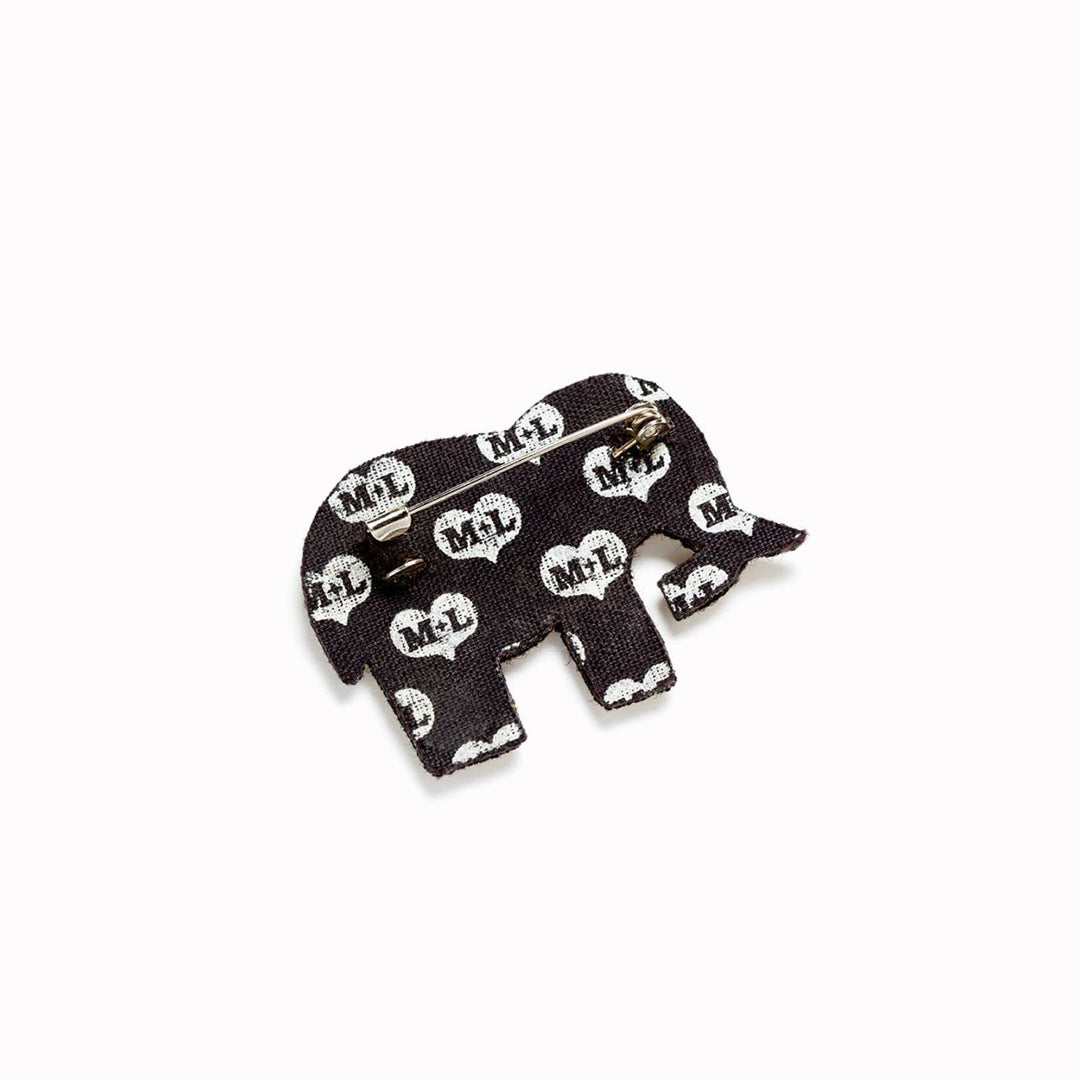 A beautifully hand-embroidered gold elephant lapel pin.. Rear view of badge, From Macon & Lesquoy, French Hand Embroidered badges and patches using Cannetille thread.