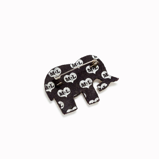 A beautifully hand-embroidered gold elephant lapel pin.. Rear view of badge, From Macon & Lesquoy, French Hand Embroidered badges and patches using Cannetille thread.
