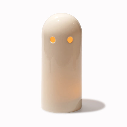 Porcelain Ghost Tea Light Holder lit on white by Studio Arhoj