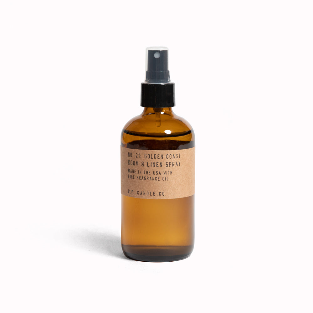 PF Candle Co Golden Coast Room and Linen Spray. Supplied in apothecary inspired amber glass bottles with their signature kraft label, part of PFCandleCo core collection.