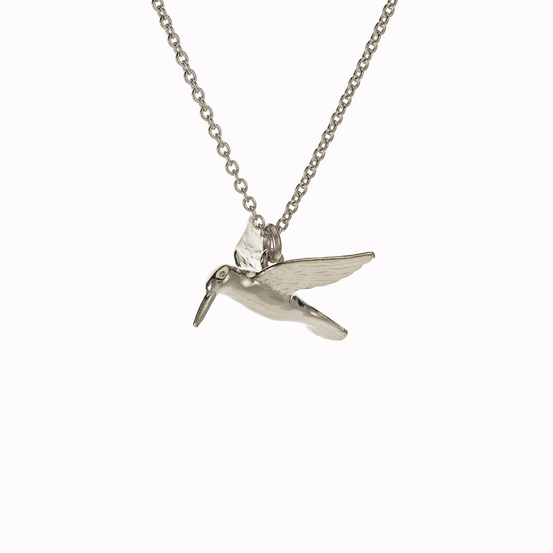 A delicately detailed flying hummingbird necklace from Alex Monroe's Classics jewellery collection.