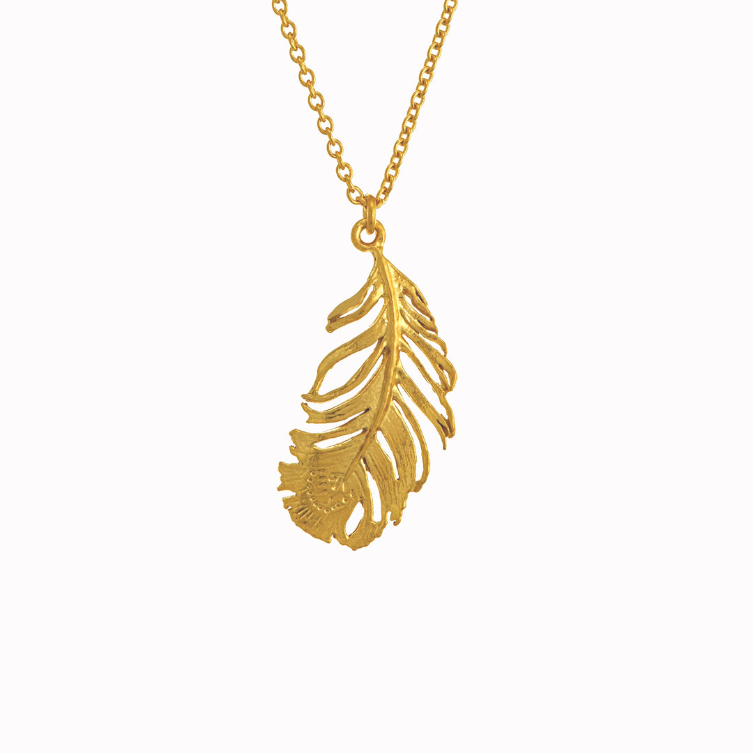 A peacock feather pendant necklace with engraved 'eye' motif from Alex Monroe's Classics jewellery collection.