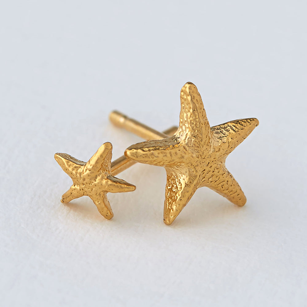 Gold Asymmetric Starfish stud earrings by Alex Monroe. Jewellery made in England.
