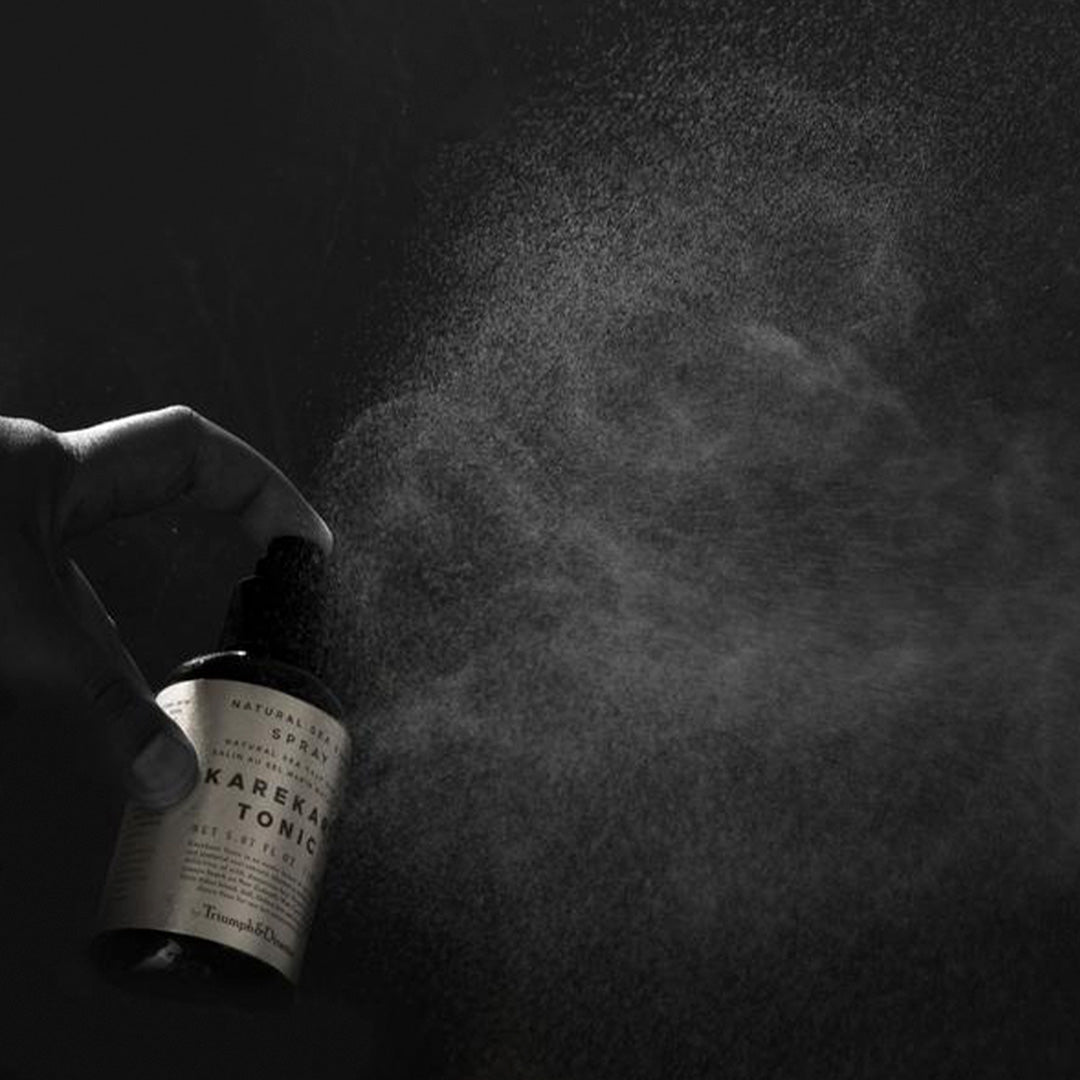 Karekare Hair Tonic is Triumph & Disaster's all natural fusion of sea salt spray and essential root extracts, blended to deliver textured beach hair miles away from the coast.  Spraying product detail
