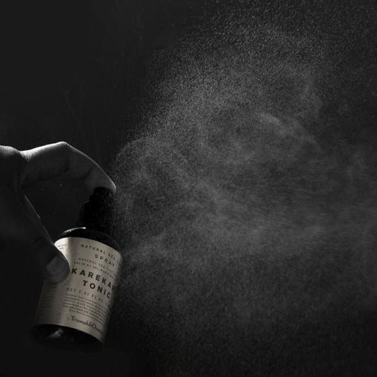 Karekare Hair Tonic is Triumph & Disaster's all natural fusion of sea salt spray and essential root extracts, blended to deliver textured beach hair miles away from the coast.  Spraying product detail