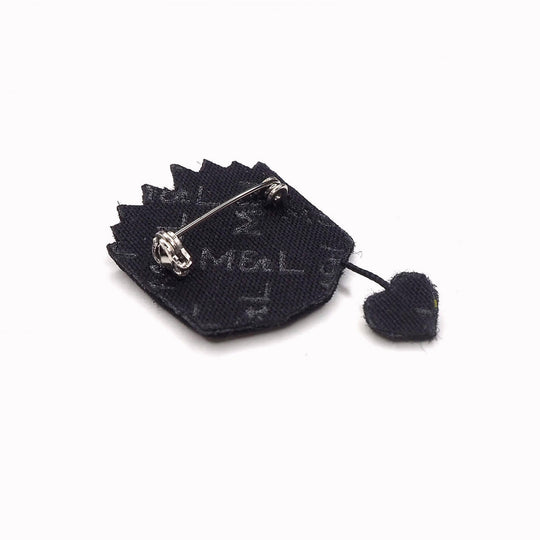 Open Book hand embroidered decorative lapel pin. Rear view of badge, From Macon & Lesquoy, French Hand Embroidered badges and patches using Cannetille thread.