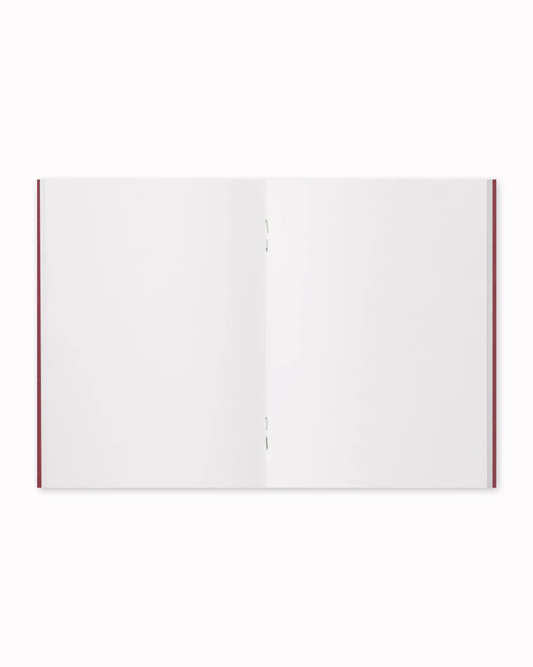 003 Plain Paper insert is an interchangeable refill for the Traveler’s Co Passport sized notebook system.