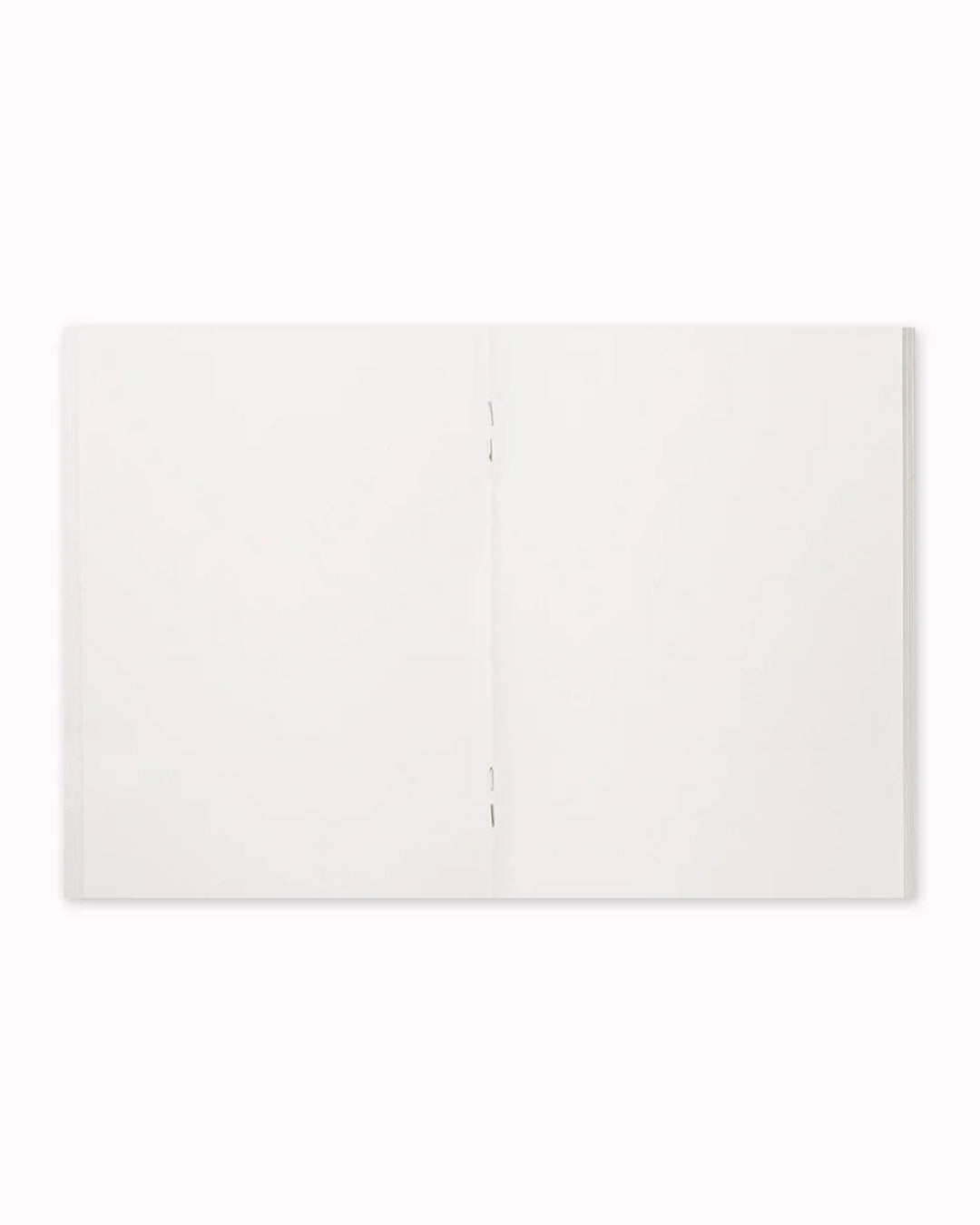 008 Sketch Paper is an interchangeable refill for the Traveler’s Co Passport sized notebook system.