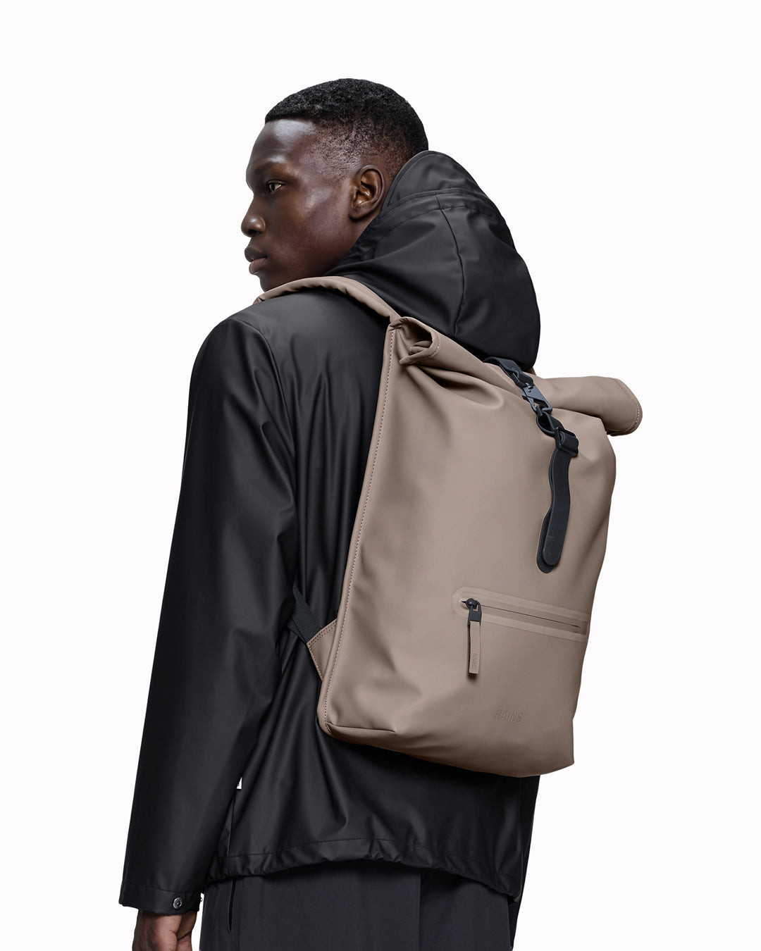 The Rolltop Rucksack is one of Rains' signature designs, built around a simple rolltop closure that offers flexible storage and dependable weather protection.