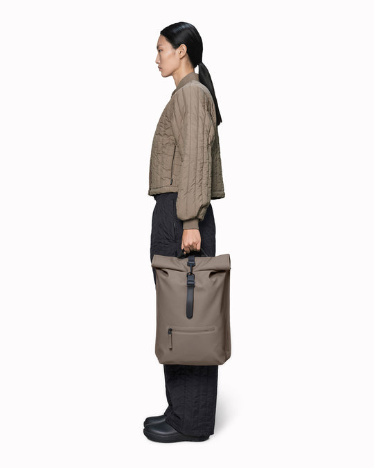 The Rolltop Rucksack is one of Rains' signature designs, built around a simple rolltop closure that offers flexible storage and dependable weather protection.