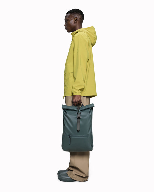 The Rolltop Rucksack is one of Rains' signature designs, built around a simple rolltop closure that offers flexible storage and dependable weather protection.