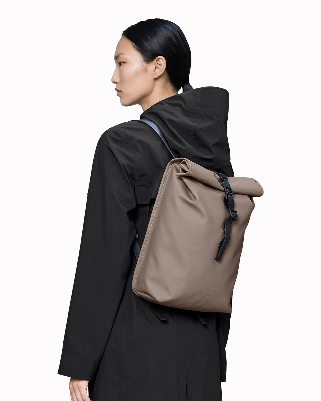 The Rolltop Rucksack Mini takes Rains' signature backpack design and scales it down into a more compact format.