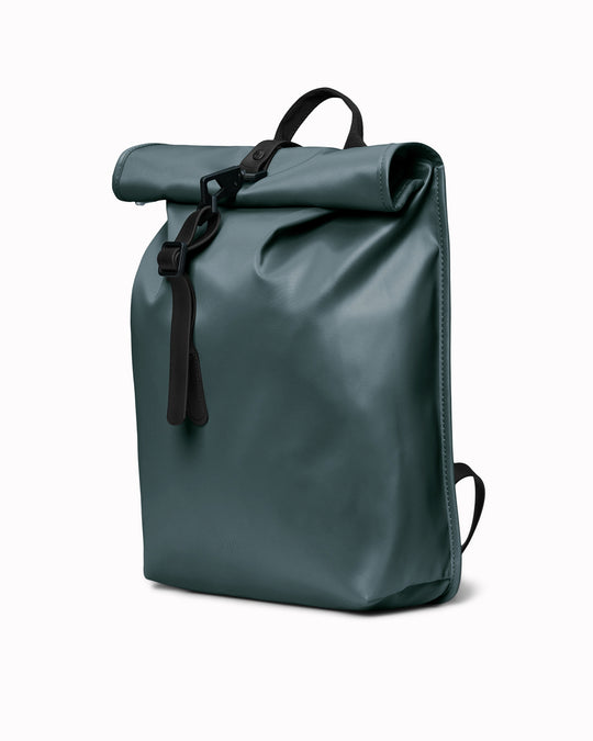 The Rolltop Rucksack Mini takes Rains' signature backpack design and scales it down into a more compact format.