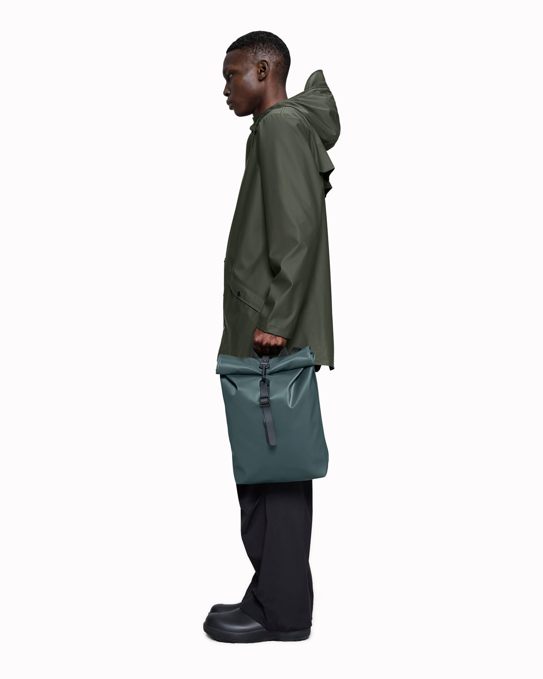 The Rolltop Rucksack Mini takes Rains' signature backpack design and scales it down into a more compact format.