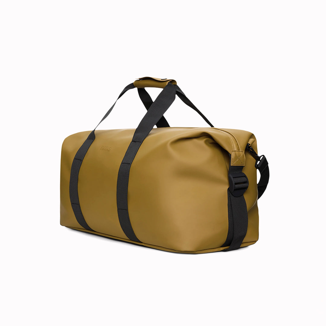 Angled - Hilo Weekend Bag by Rains is a great size for use as a contemporary gym or overnight bag. This Dawn colourway is from their SS26 collection of fashion colours.