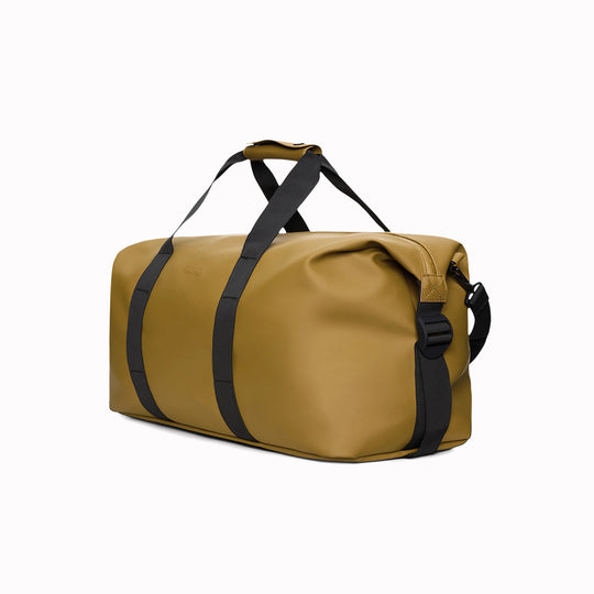 Angled - Hilo Weekend Bag by Rains is a great size for use as a contemporary gym or overnight bag. This Dawn colourway is from their SS26 collection of fashion colours.