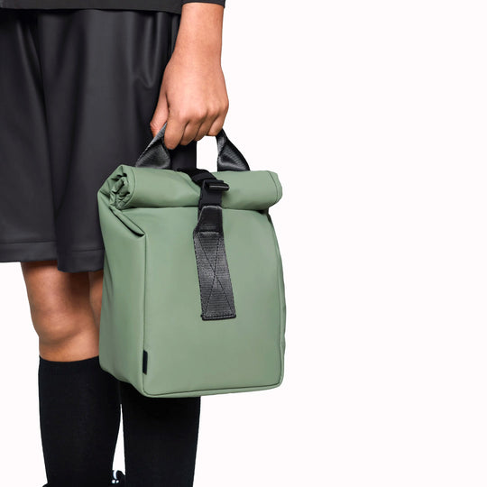 The Rains Lunch Bag is a stylish and functional insulated lunch bag designed for keeping your food and drinks fresh on the go.