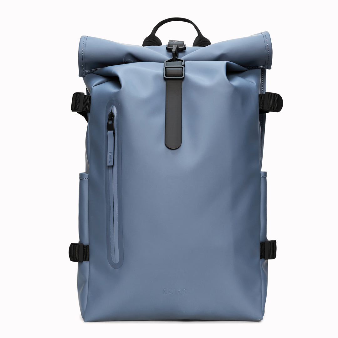 The Rolltop Rucksack Large expands on one of Rains’ most recognisable designs, combining a generous capacity with a clean, weather-ready silhouette. 