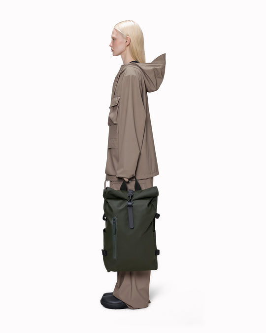 The Rolltop Rucksack Large expands on one of Rains’ most recognisable designs, combining a generous capacity with a clean, weather-ready silhouette. 