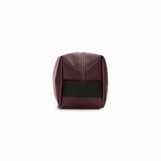 A unisex wash bag by Rains featuring one main compartment with inside sleeve pockets and is large enough to fit one’s essential toiletries.