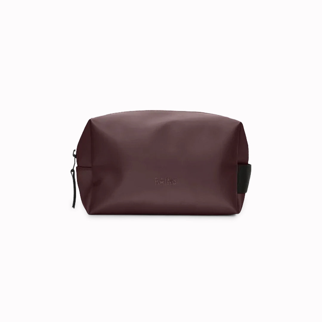 A unisex wash bag by Rains featuring one main compartment with inside sleeve pockets and is large enough to fit one’s essential toiletries.
