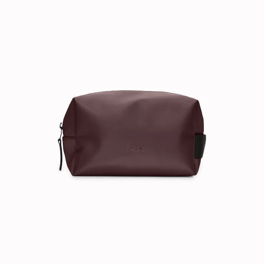 A unisex wash bag by Rains featuring one main compartment with inside sleeve pockets and is large enough to fit one’s essential toiletries.