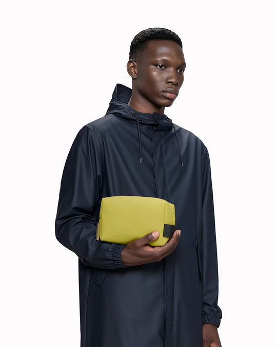 The small unisex wash bag by Rains features one main compartment with inside sleeve pockets and is large enough to fit one’s essential toiletries.