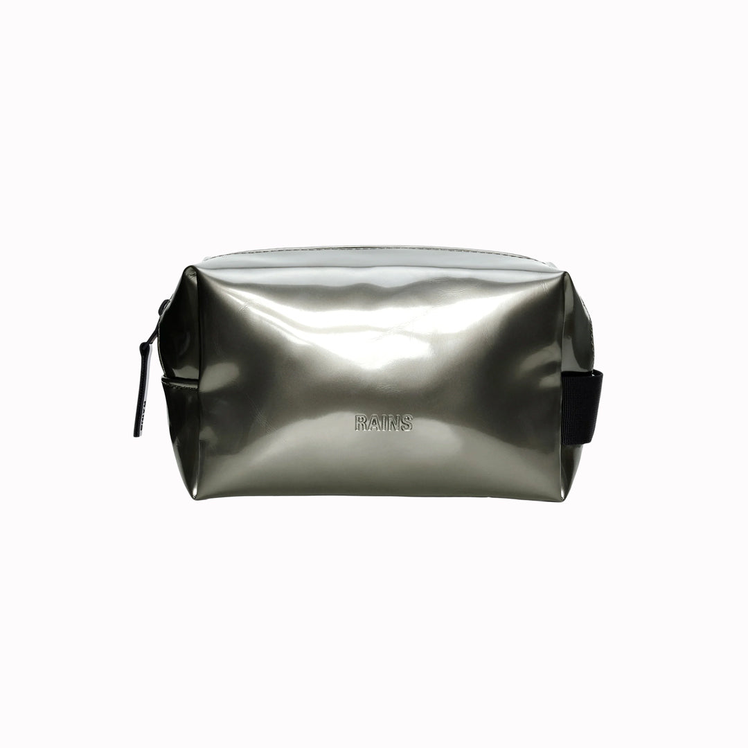 SS26 Wash Bags by Rains in their new season metallic silver Raven colour. A cube shaped wash bag with one main compartment with inside sleeve pockets and is large enough to fit one’s essential toiletries. 