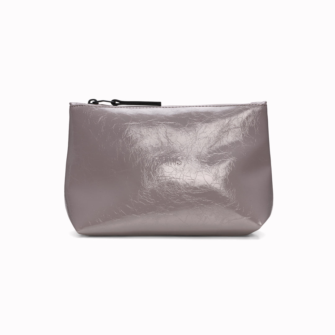 A compact wash bag with the clean, understated design Rains is known for. The Cosmetic Bag pares things back to a single compartment, with a softly structured silhouette