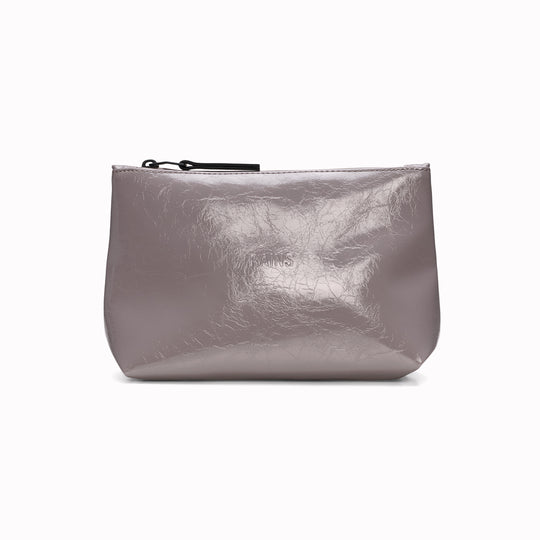 A compact wash bag with the clean, understated design Rains is known for. The Cosmetic Bag pares things back to a single compartment, with a softly structured silhouette
