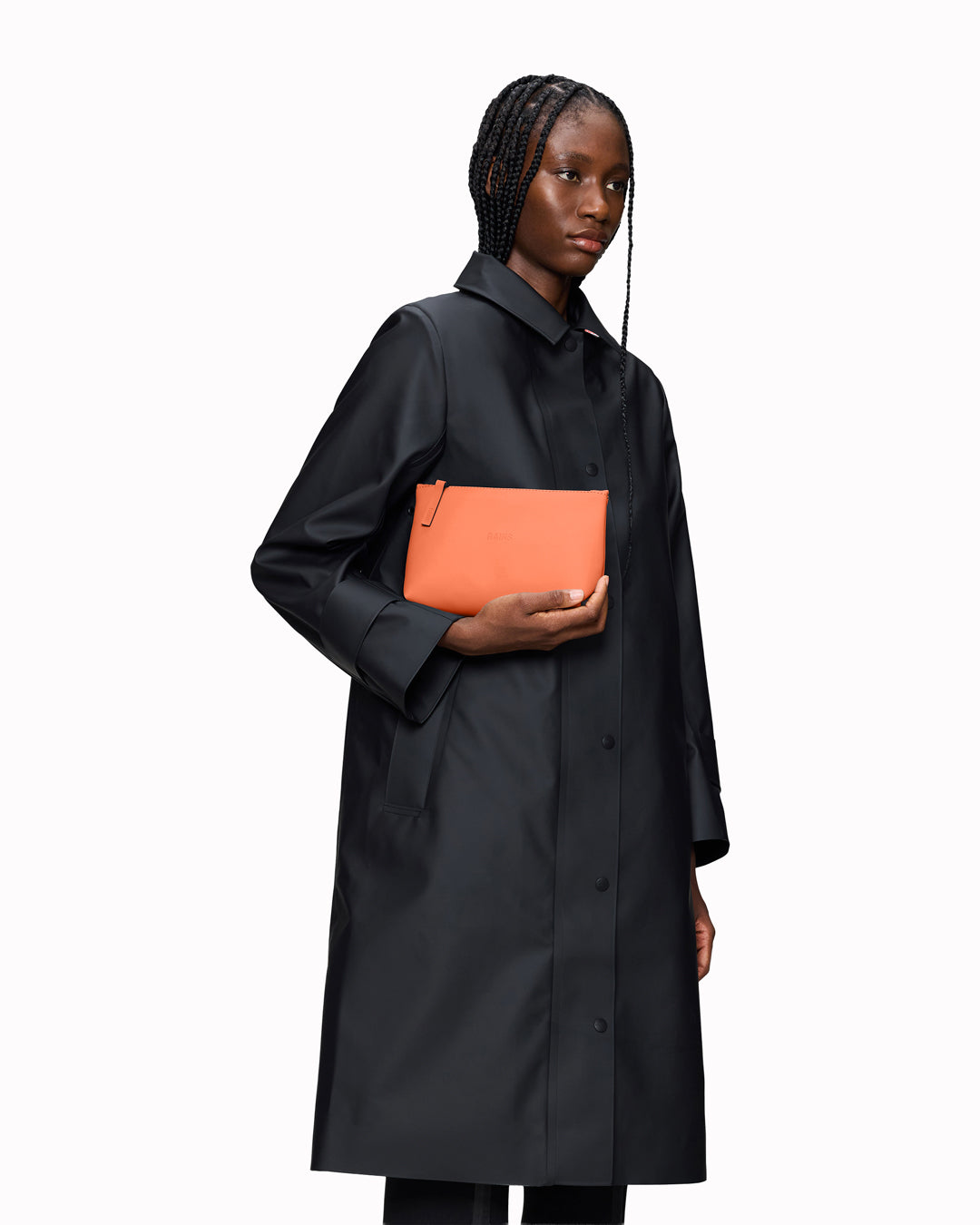 A compact wash bag with the clean, understated design Rains is known for. The Cosmetic Bag pares things back to a single compartment, with a softly structured silhouette