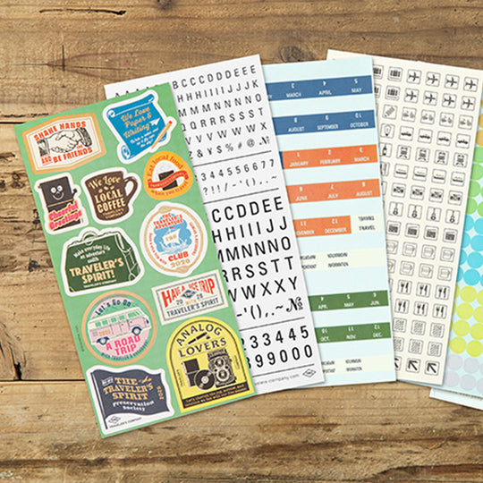 This is a sticker set for customizing TRAVELER’S notebook that makes it more fun, including index and pocket stickers, icon stickers to represent different plans, dry transfer, and stickers to decorate the cover.