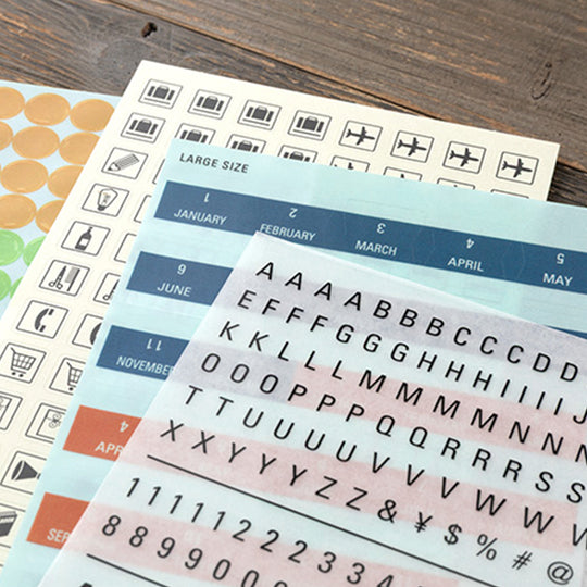 This is a sticker set for customizing TRAVELER’S notebook that makes it more fun, including index and pocket stickers, icon stickers to represent different plans, dry transfer, and stickers to decorate the cover.