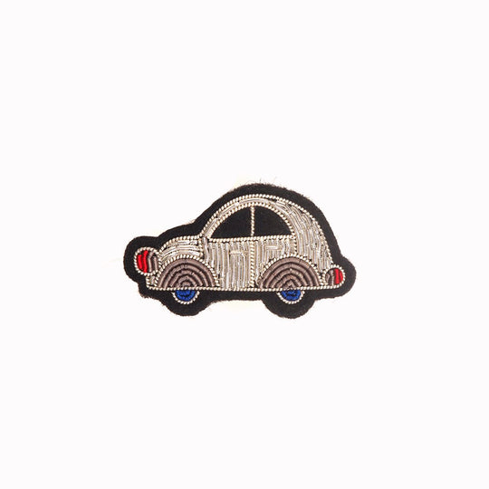 Hand-embroidered 2CV Brooch by Parisian fashion accessory brand Macon et Lesquoy. Measuring approximately 22mm by 47mm, the 2CV design pays homage to this much loved and absolute classic French car.