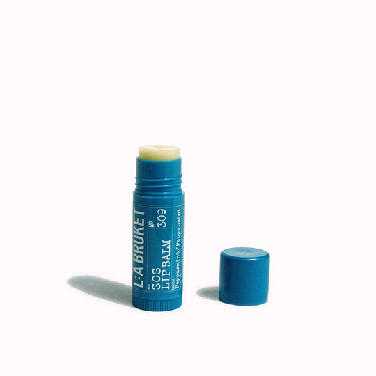 SOS Lip Balm 309 by L:A Bruket is a generous minty lip balm for a cooling kick and a hit of peppermint to focus the mind and ground your senses.